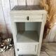 White patinated bedside table with a marble top