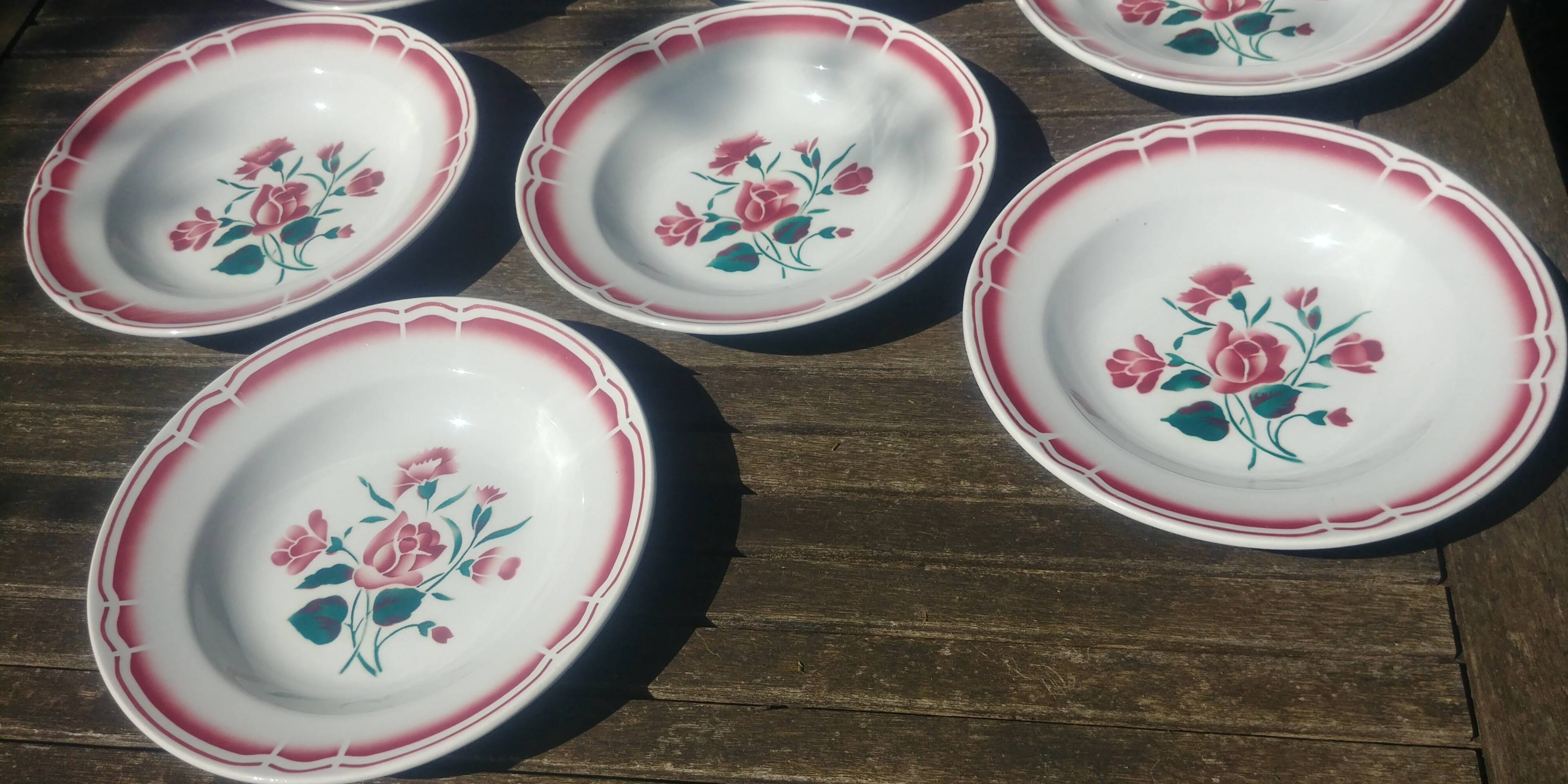 Lot of seven old soup plates from the 40s/50s decorated with roses