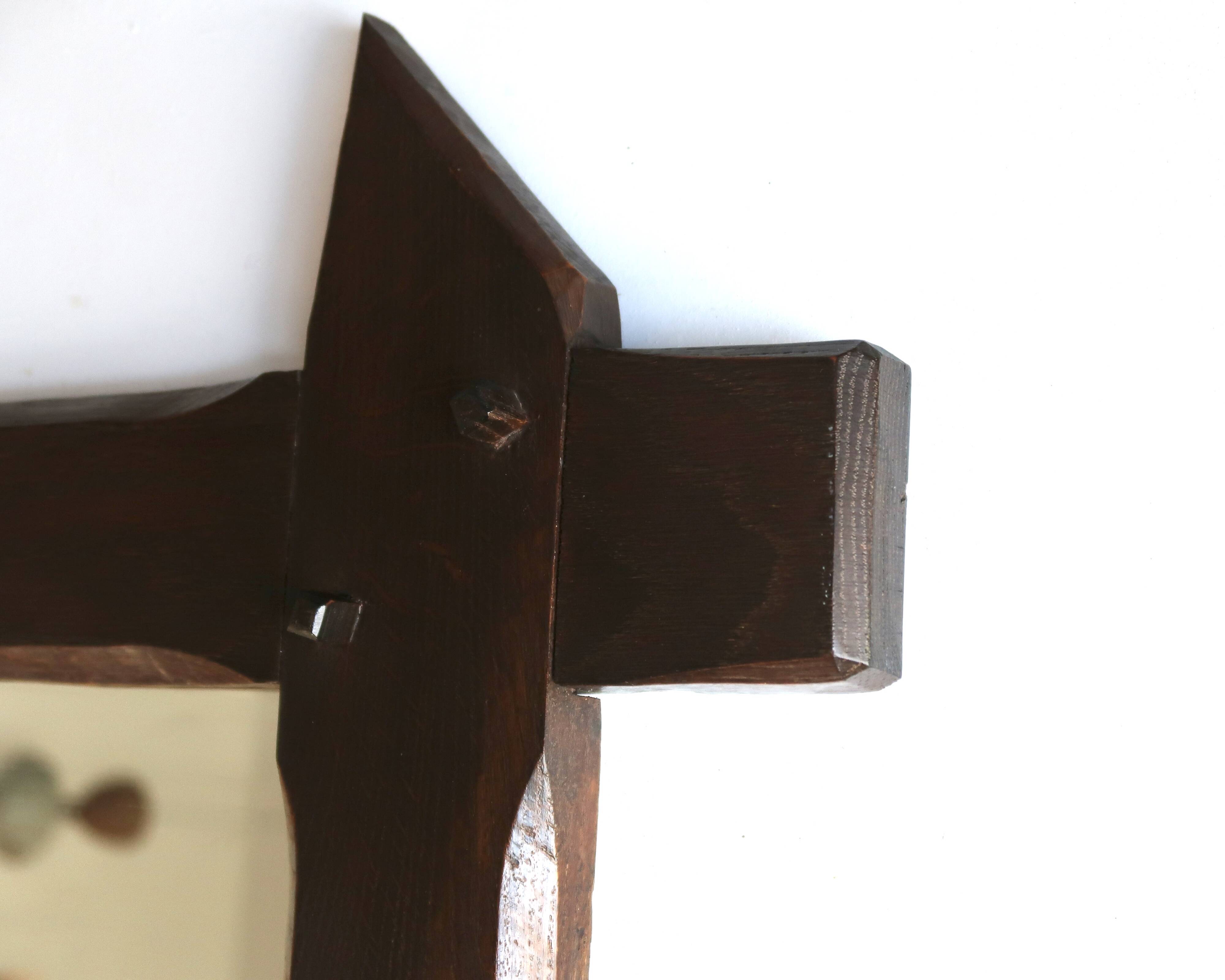 Rectangular mirror with bevelled wooden frame, 1970s.