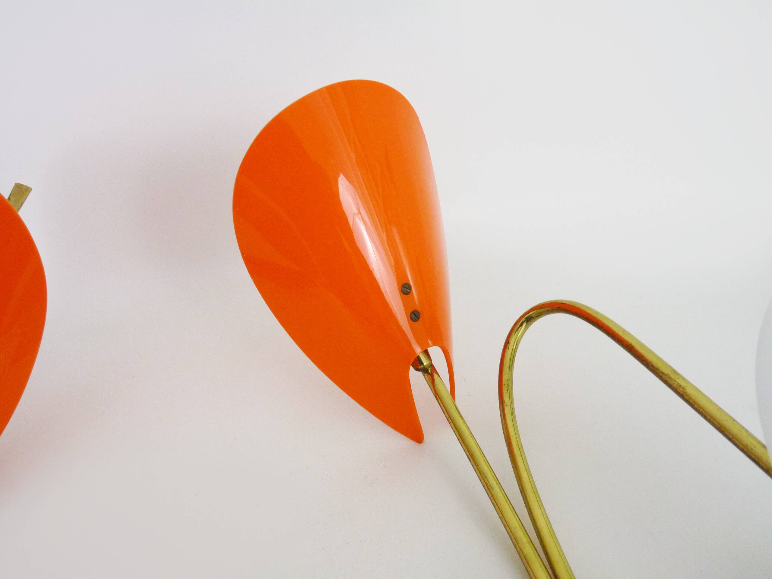 Pair of Mid-Century orange and white Arum wall sconces, Italy, 1950s