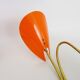Pair of Mid-Century orange and white Arum wall sconces, Italy, 1950s