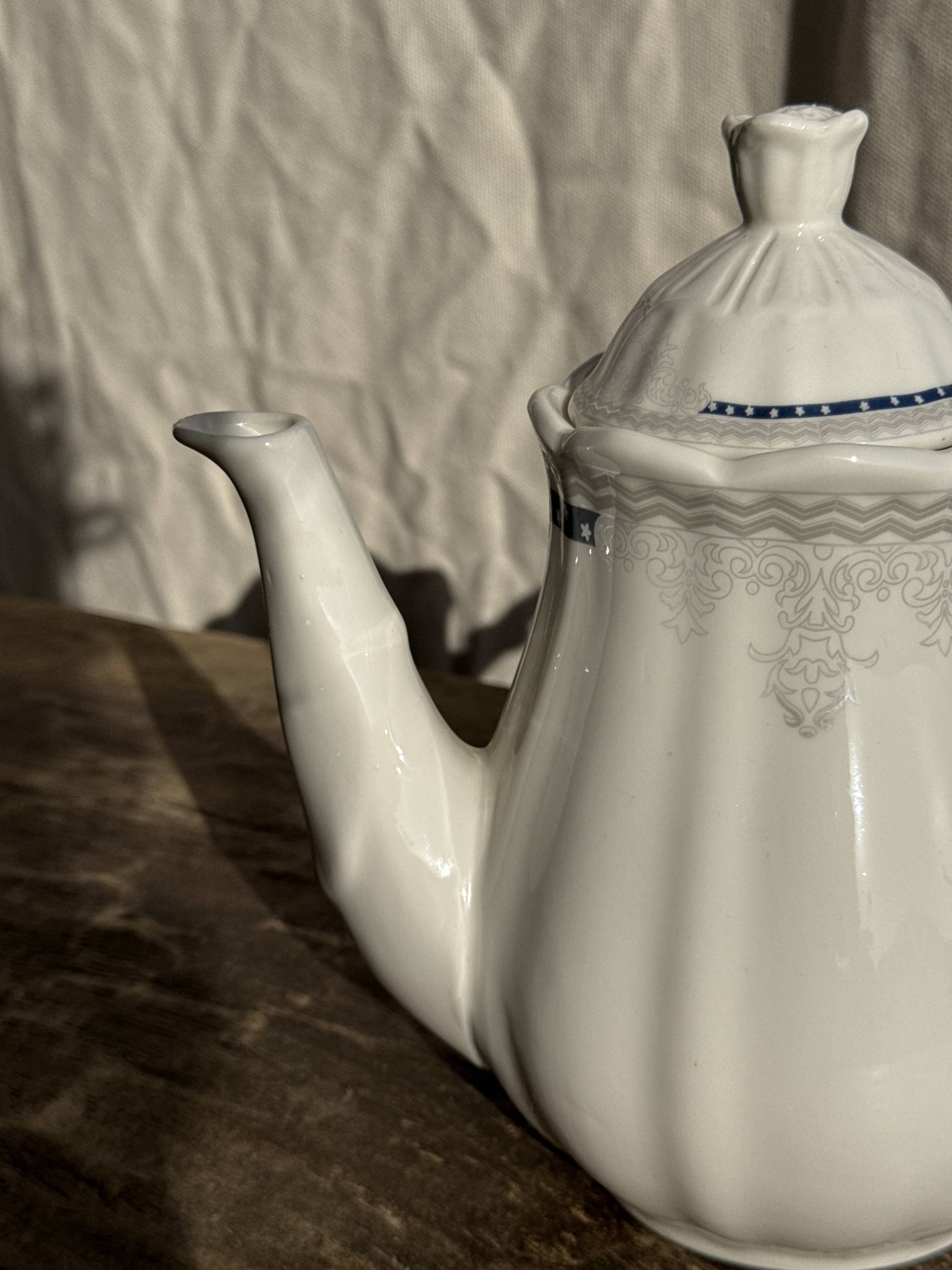 White earthenware teapot with blue and silver trim H22.5