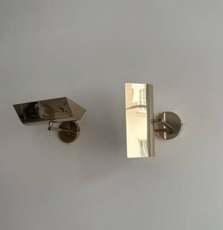 Pair of vintage adjustable solid brass wall lights France 1970