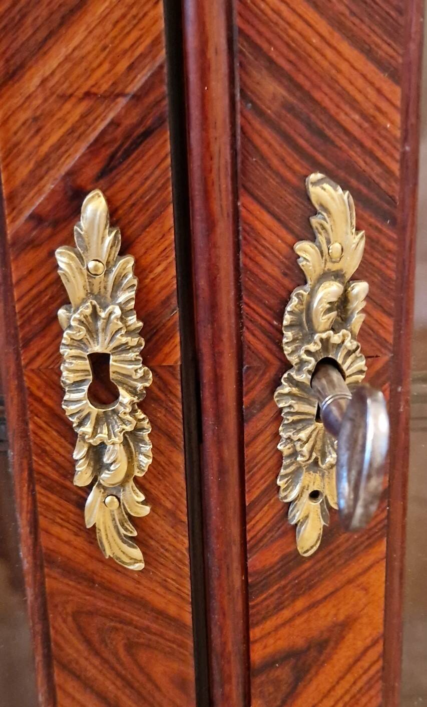Napoleon III display cabinet in marquetry, Louis XV style, black marble, gilded bronze.