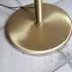 Lampadaire en laiton double éclairage