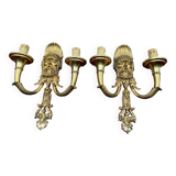 Paire d'appliques en bronze massif doré.