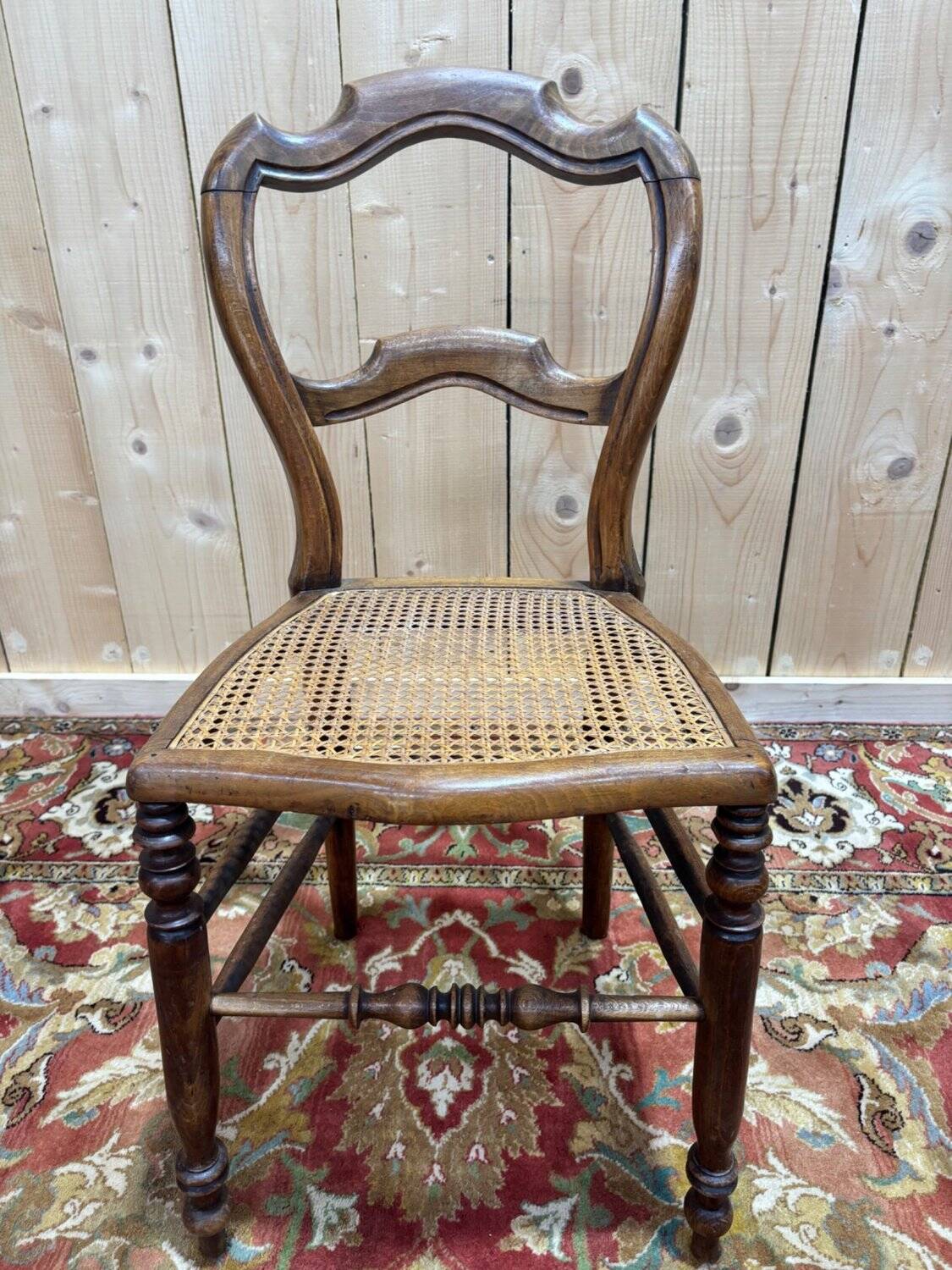 Set of 6 Louis-Philippe caned walnut chairs, 19th century.