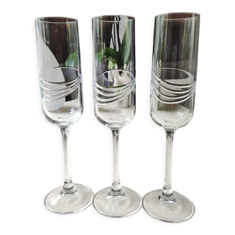 Set of 3 crystal champagne flutes. Spiral patterns