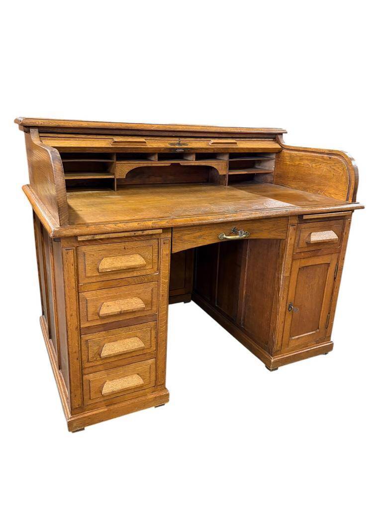 Vintage American desk made of solid wood with a curtain.