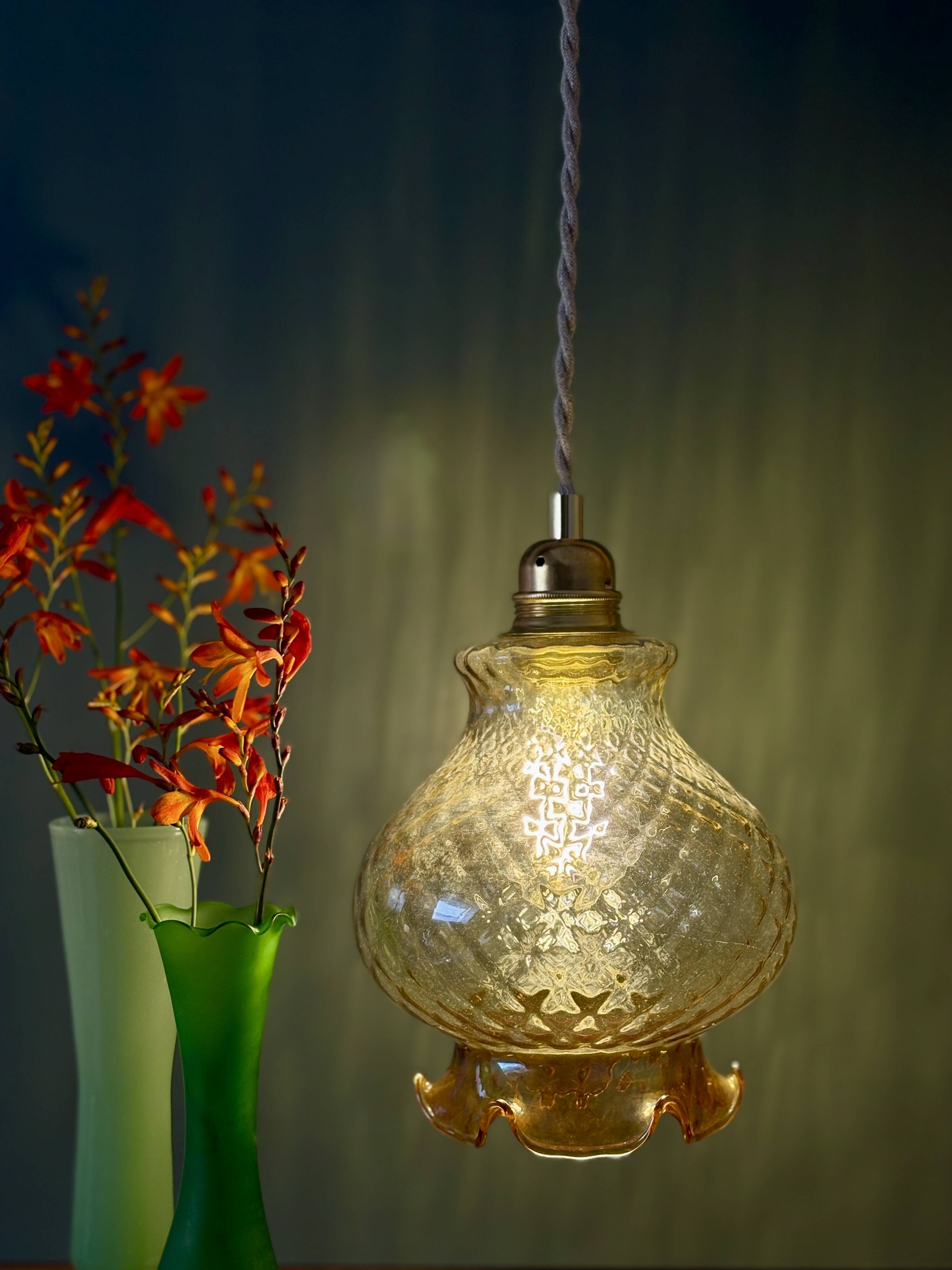 Vintage amber glass suspension globe
