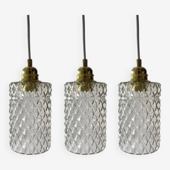 Set of three chiseled glass pendant lights of Scandinavian origin