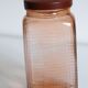 Vintage pink glass grocery jar
