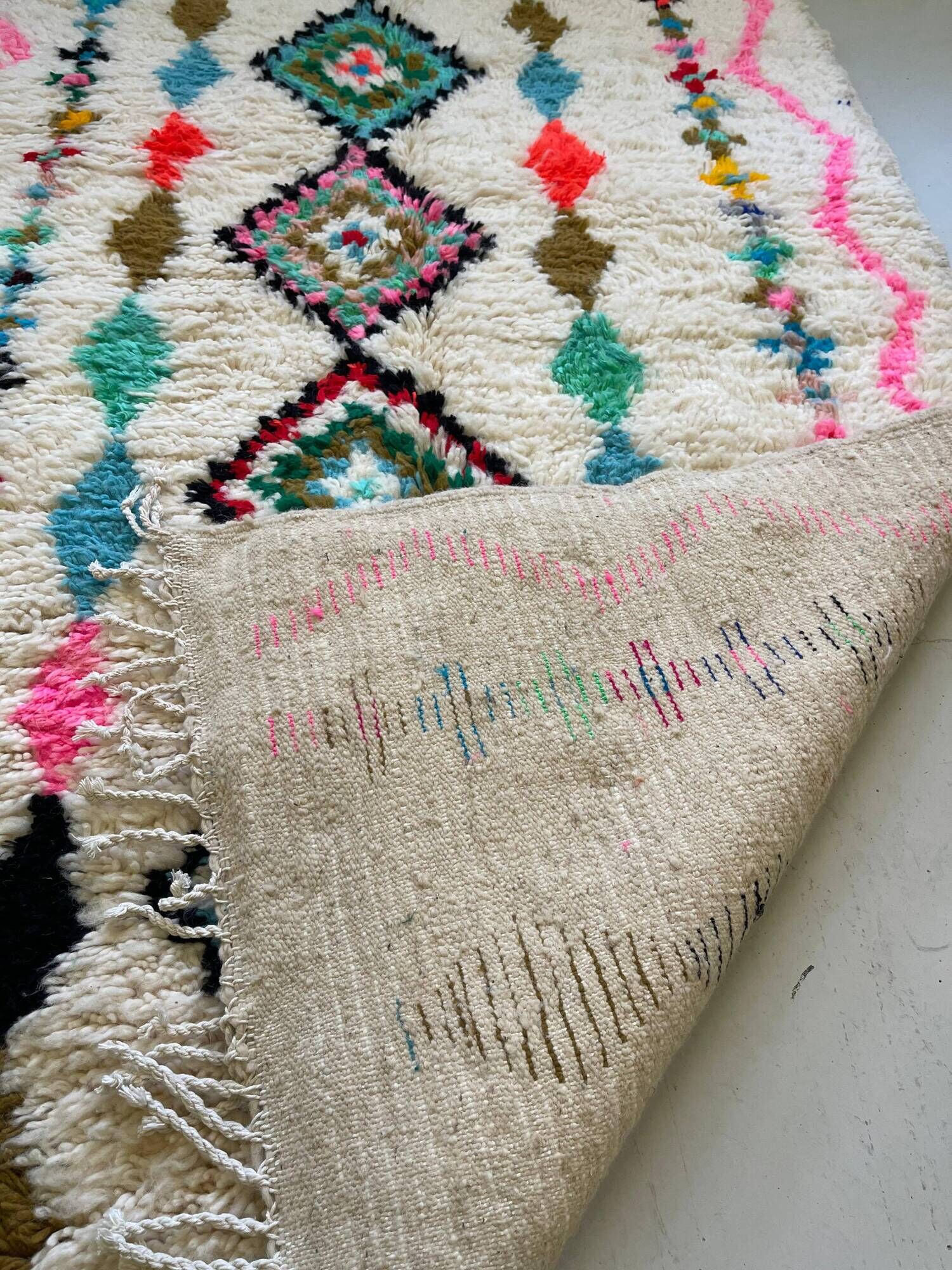 Moroccan Berber rug in ecru with multicoloured diamonds and bright pink – 240 × 139