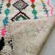 Moroccan Berber rug in ecru with multicoloured diamonds and bright pink – 240 × 139