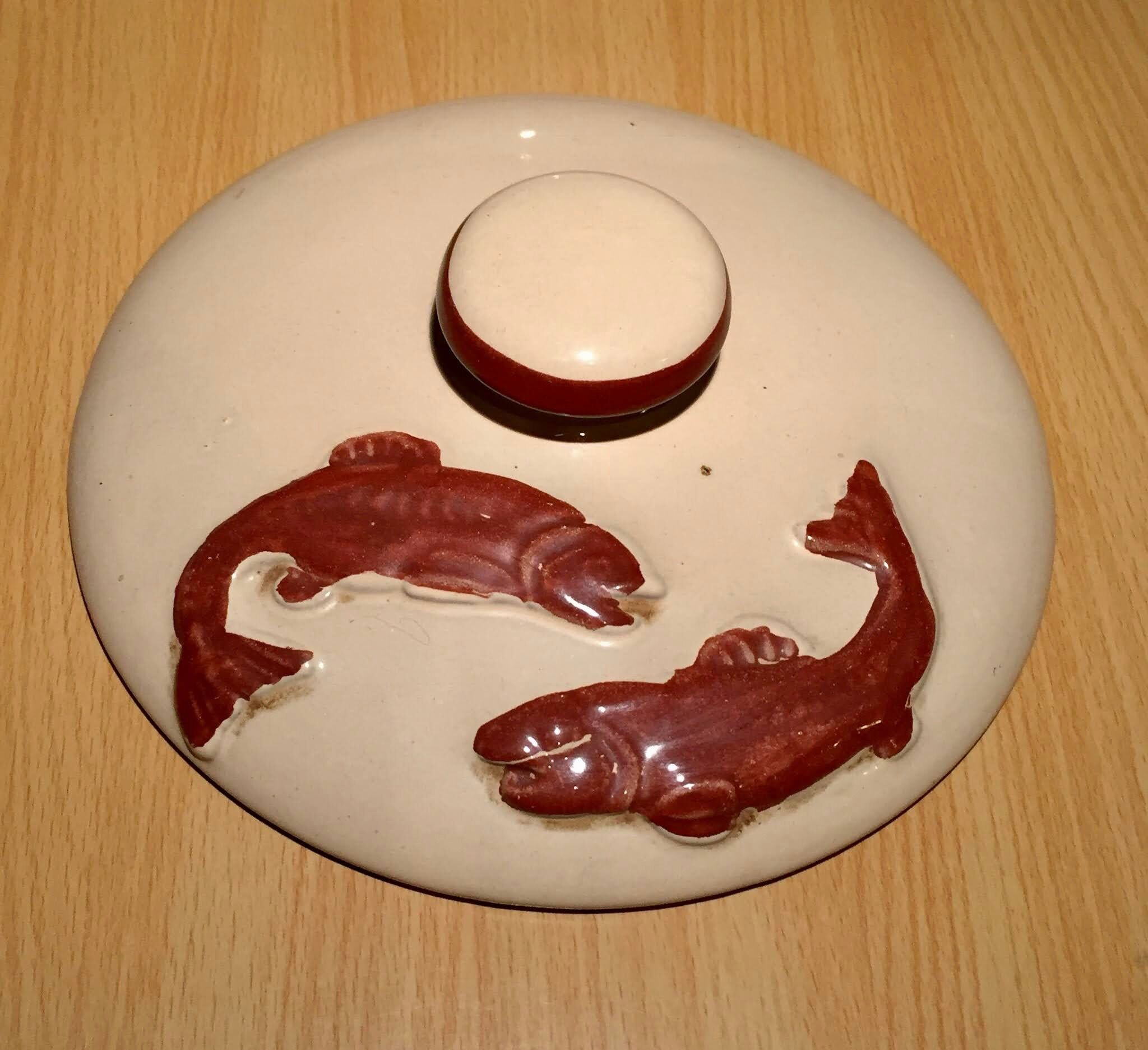 Bouillabaisse dish in terracotta fish decoration