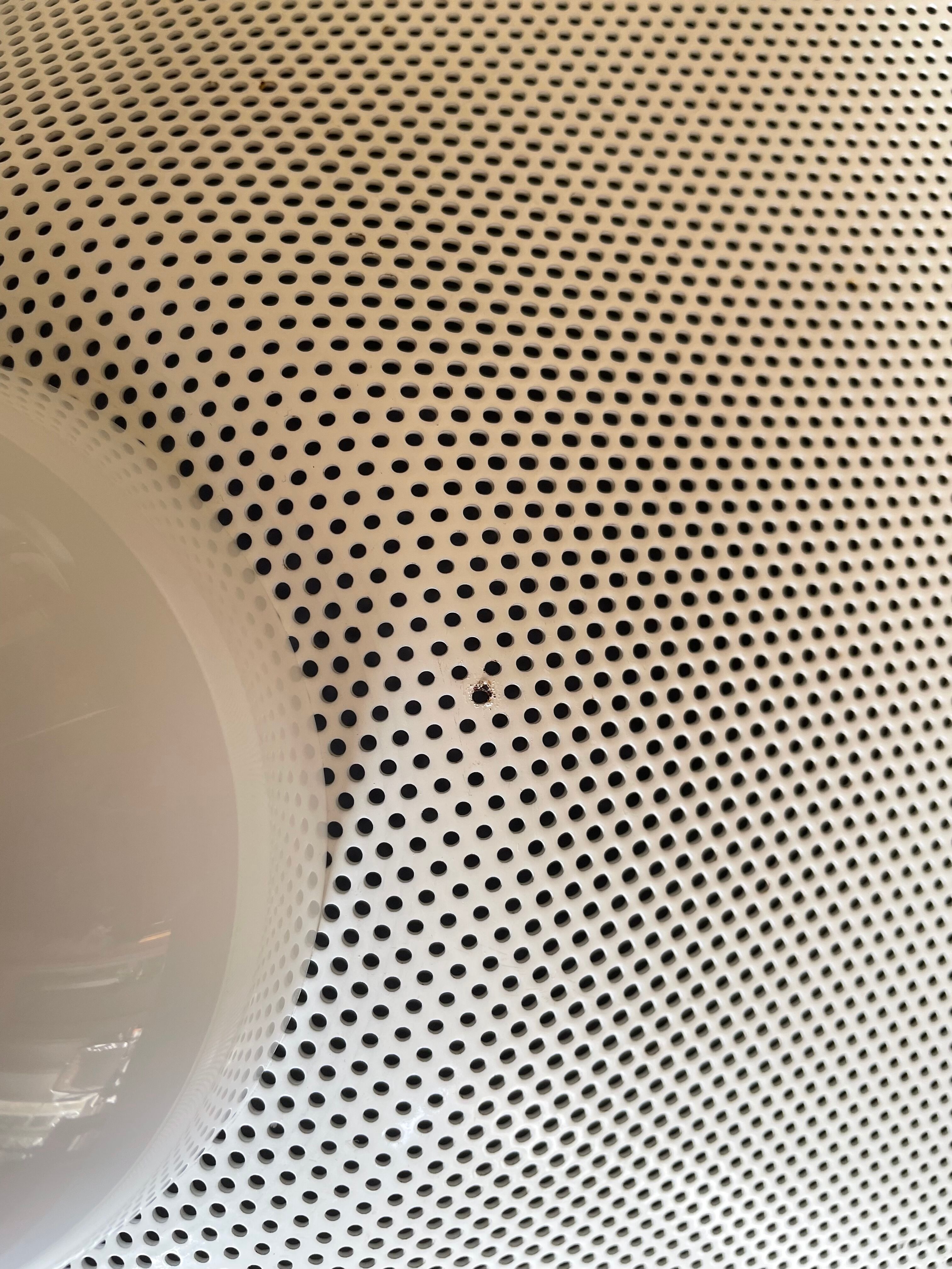 Suspension of the 80s in perforated white metal