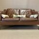 Scandinavian design 2-seater leather sofa.