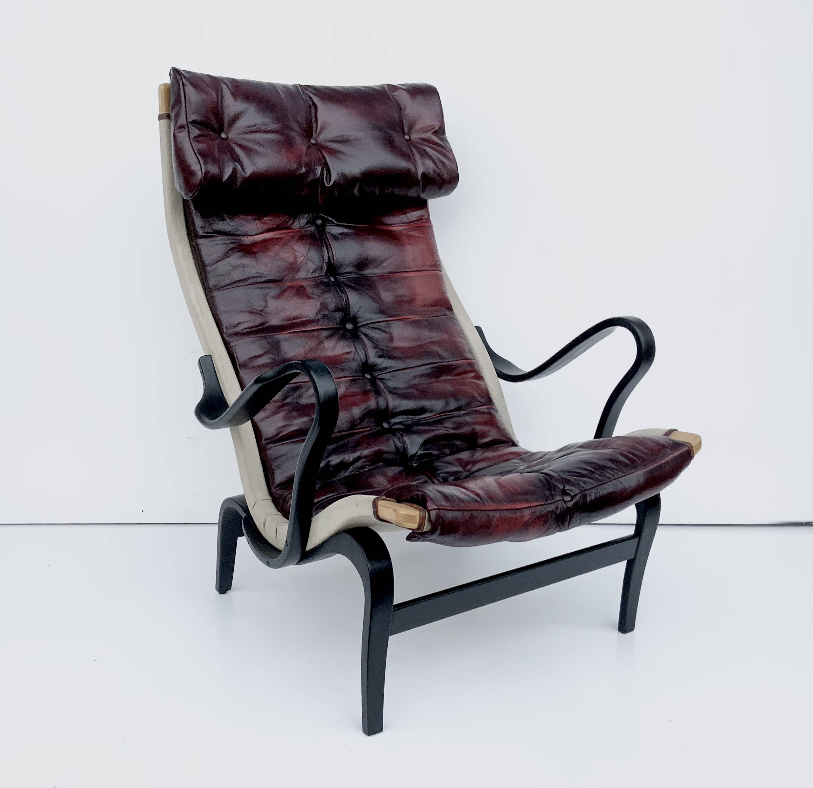 Vintage Pernilla 69 Armchair by Bruno Mathsson for Dux In Oxblood Leather