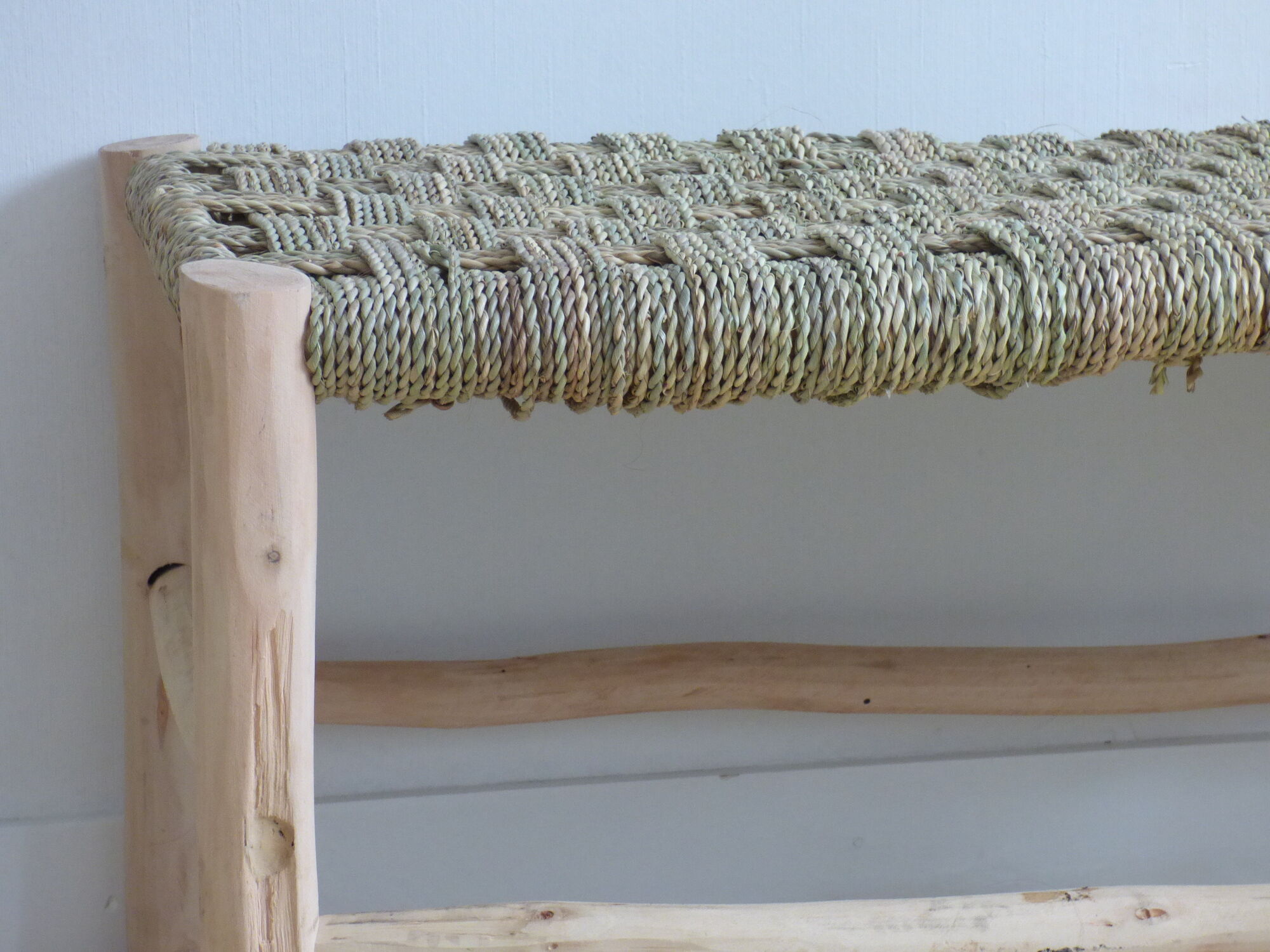 Lemon tree wood bench and braided palm leaf