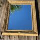 Beveled gold mirror