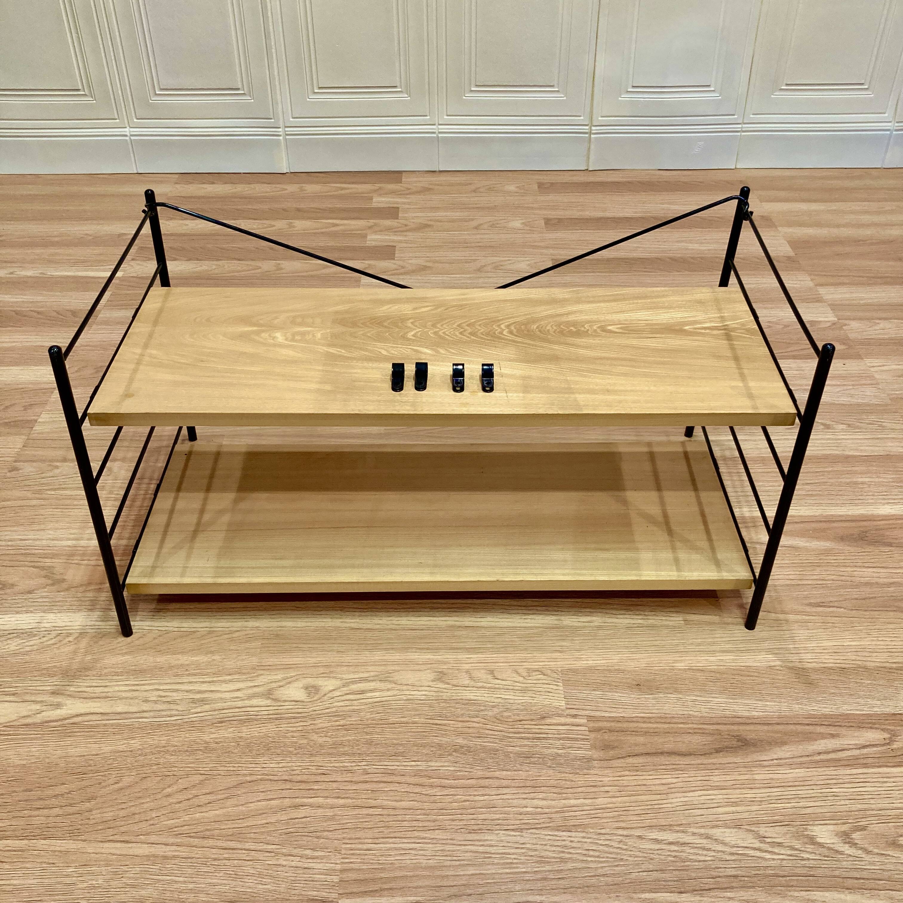 Modular metal and wood shelf design from the 1960s.