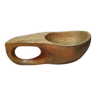 Old folk art wooden ladle or kuksa type bowl