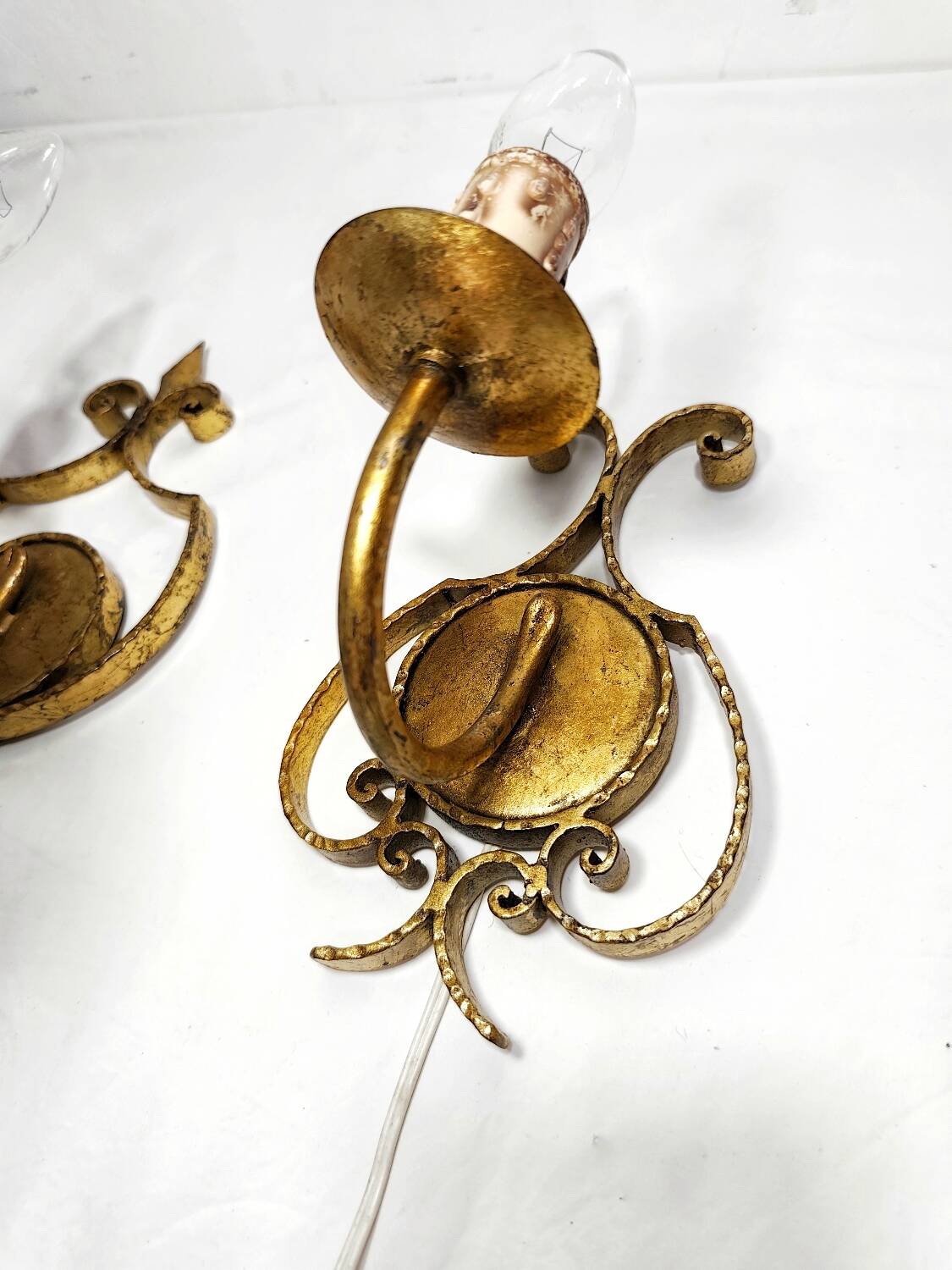 Apliques de hierro forjado y pan de oro. España, 1960s.