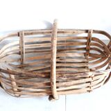 Old wooden harvest basket, slatted wooden basket, folk art.