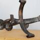 Pair of wrought iron candle holders, 60s