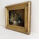 Old oil painting on wood of a bouquet of flowers signed Petit.