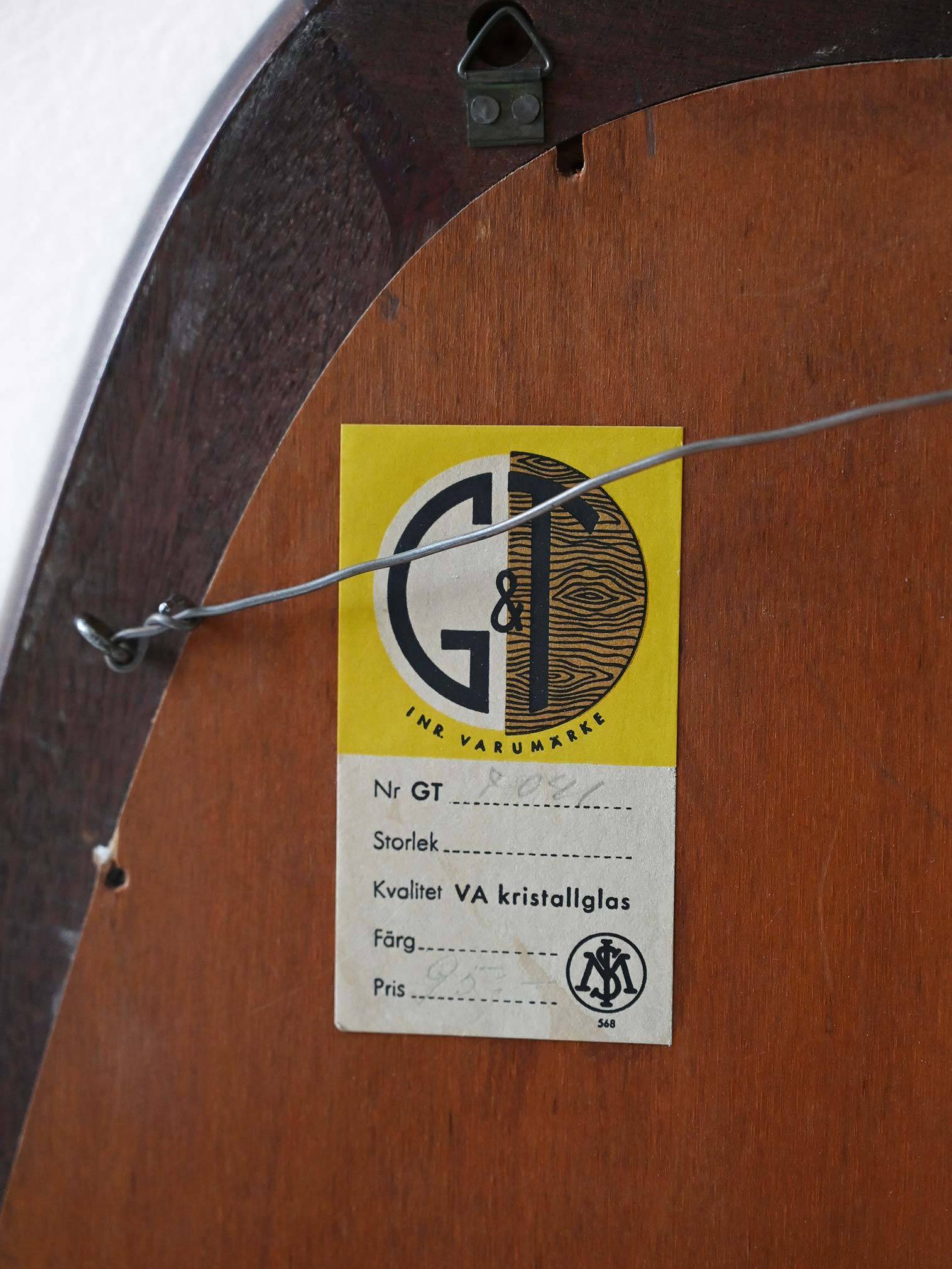 Scandinavian vintage mirror with curved mahogany frame