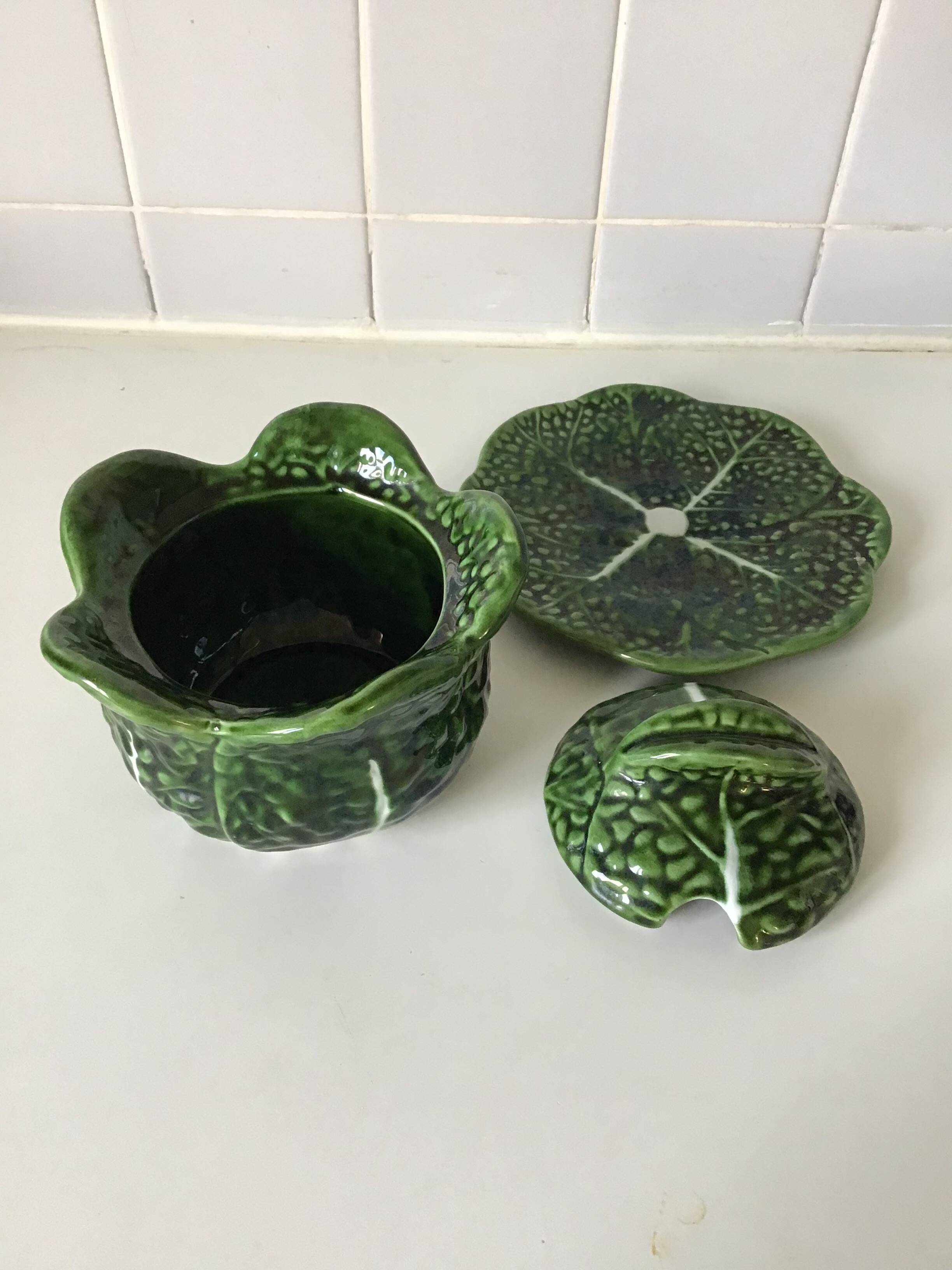 1 small bowl of cabbage with its plate underneath