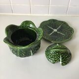 1 small bowl of cabbage with its plate underneath