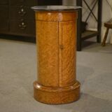 Empire gueridon in mottled maple with a blue stone top, 19th century.