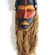 African wooden mask with shells and rope