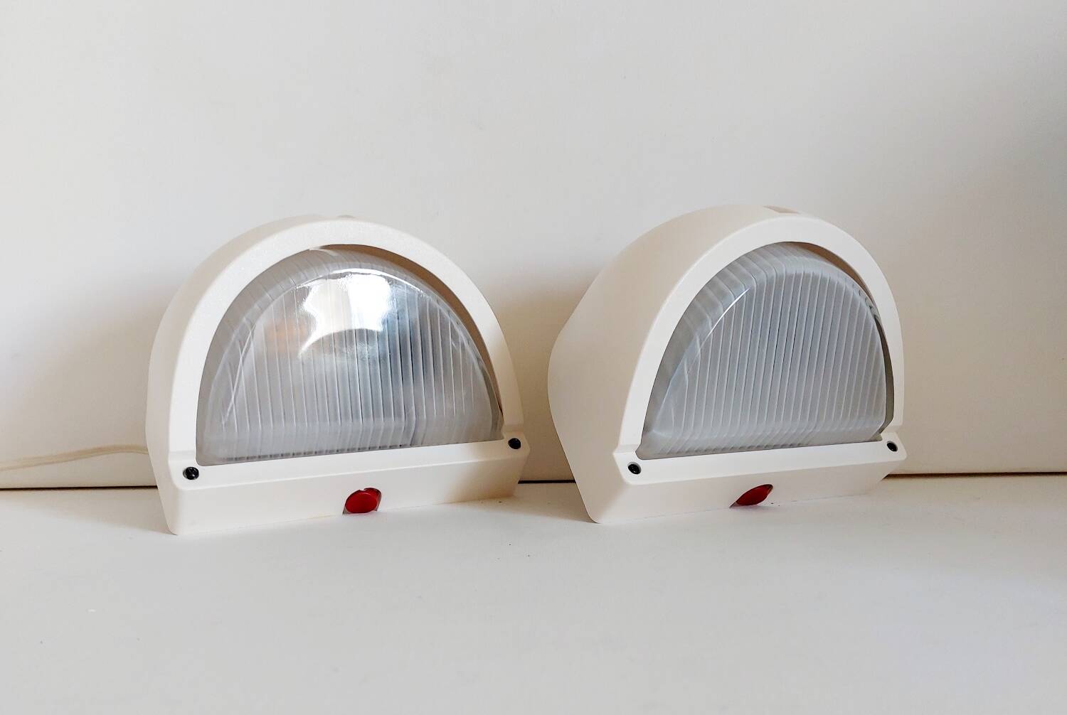 Pair of Italian designer wall lights