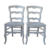 Duo of country-style chairs re-enchanted in pearl gray.