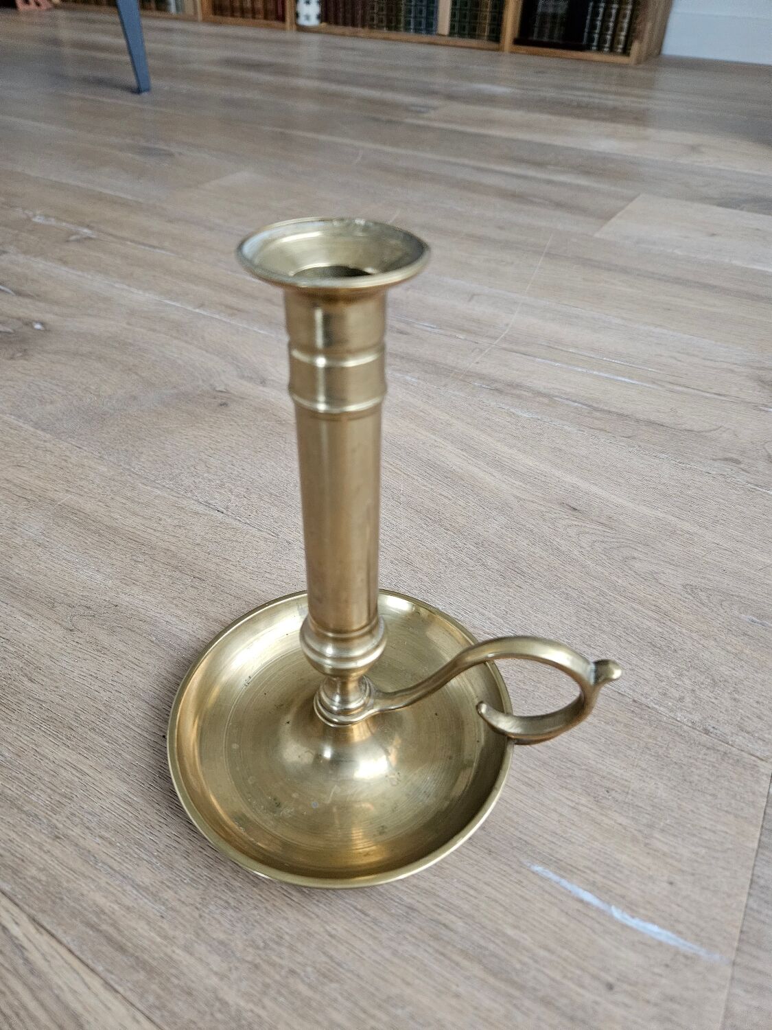 Hand candlestick with brass fitter