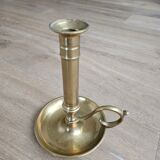 Hand candlestick with brass fitter