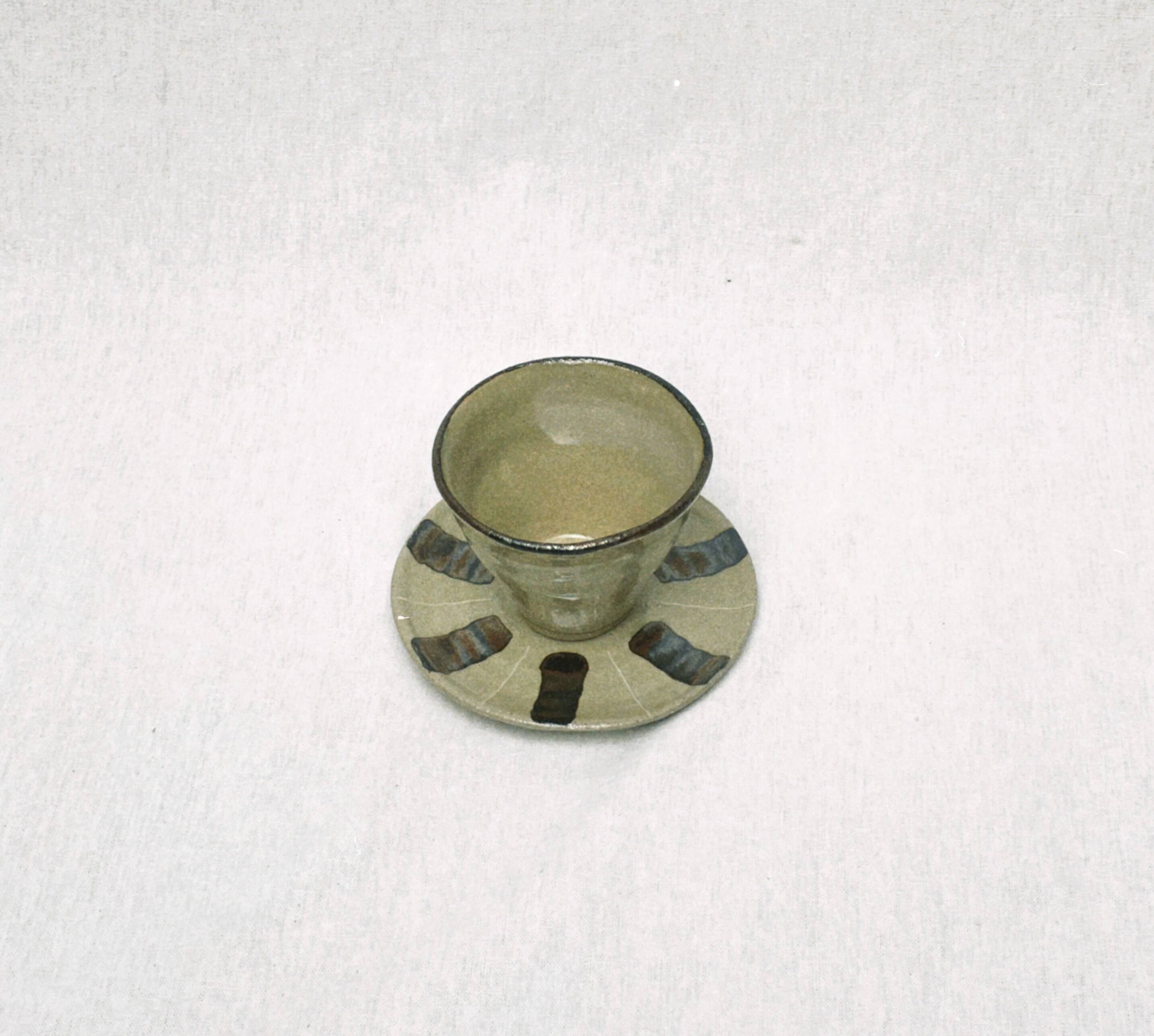 Stoneware cup and saucer