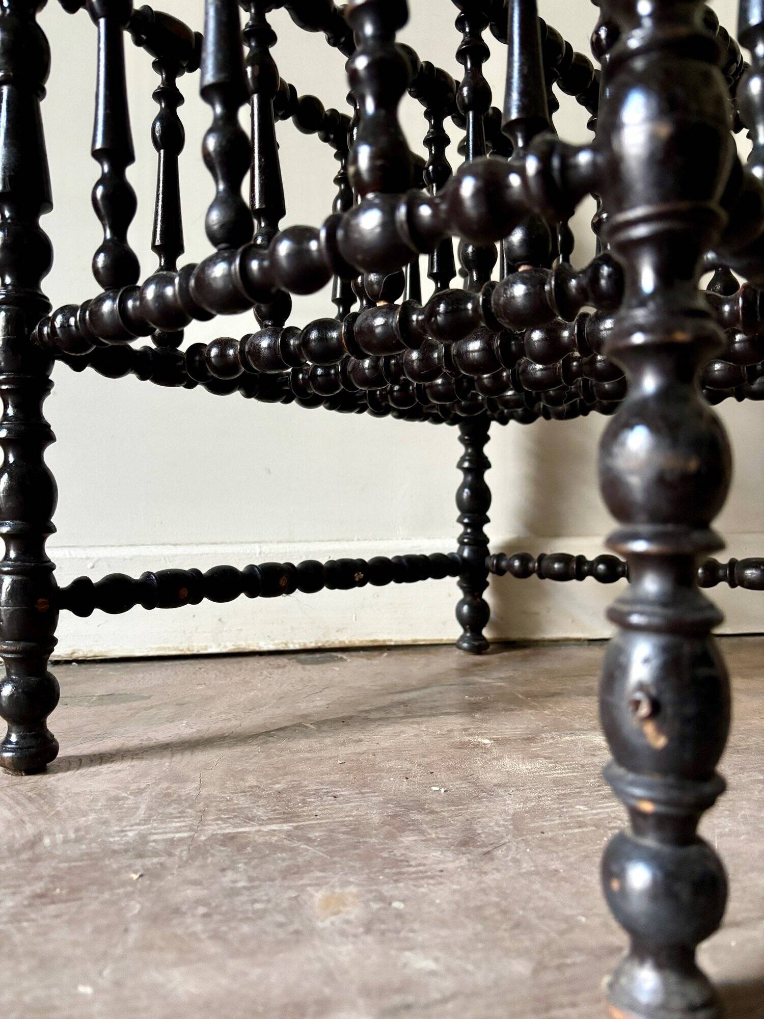 Napoleon III magazine rack in black turned wood