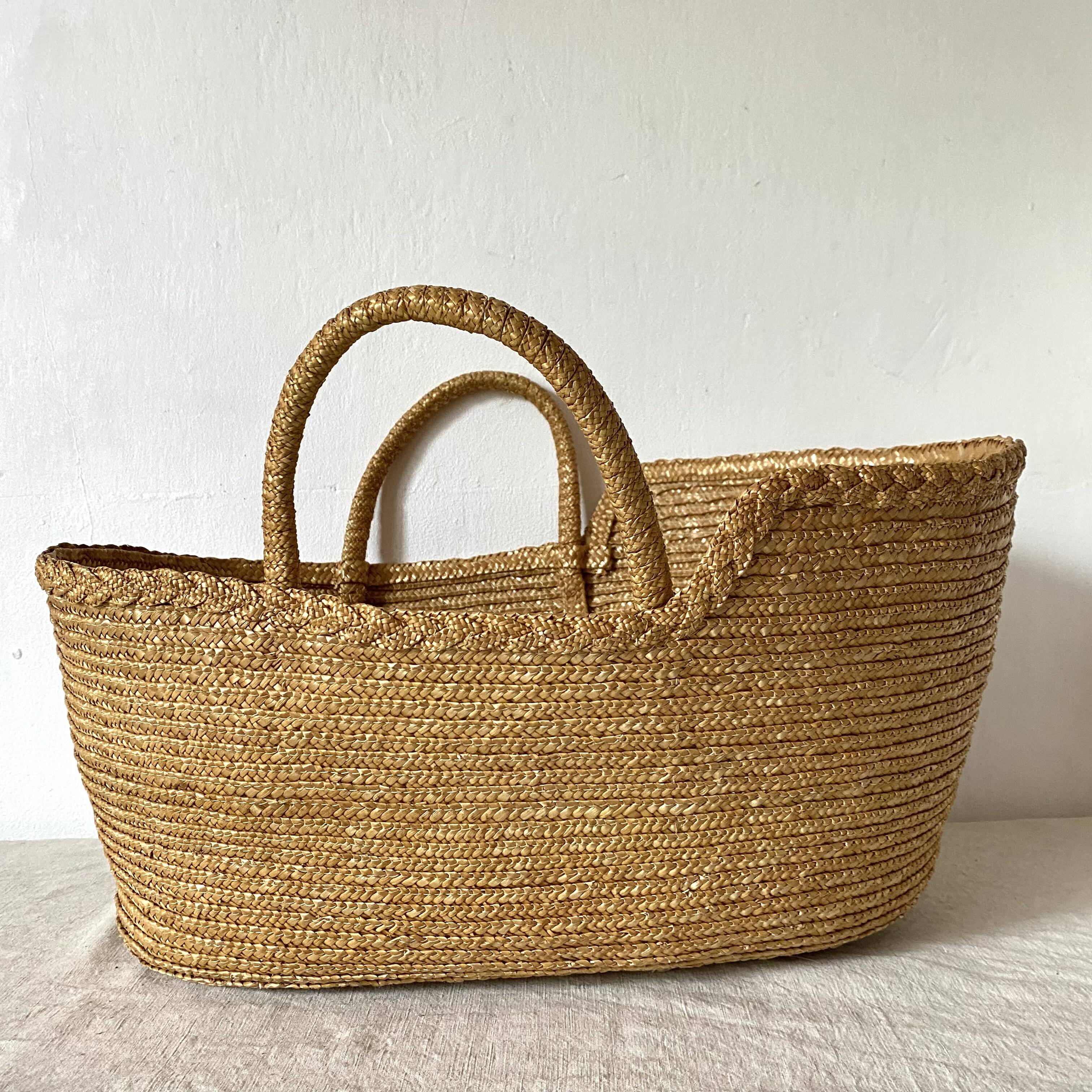 Doll's basket made of woven straw, 1970s