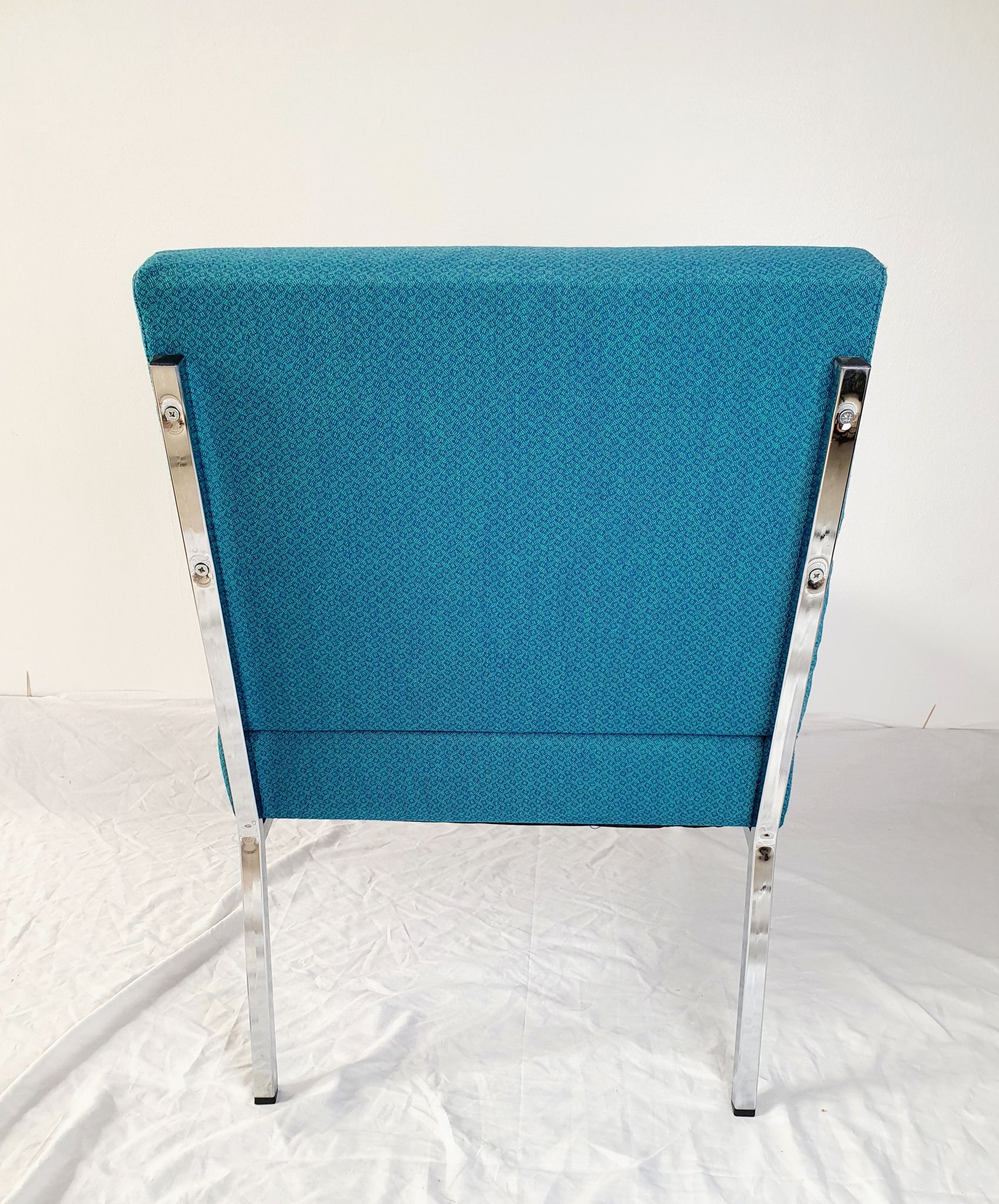 Vintage metal and fabric armchair