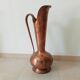 Old italian amphora vase in hammered copper