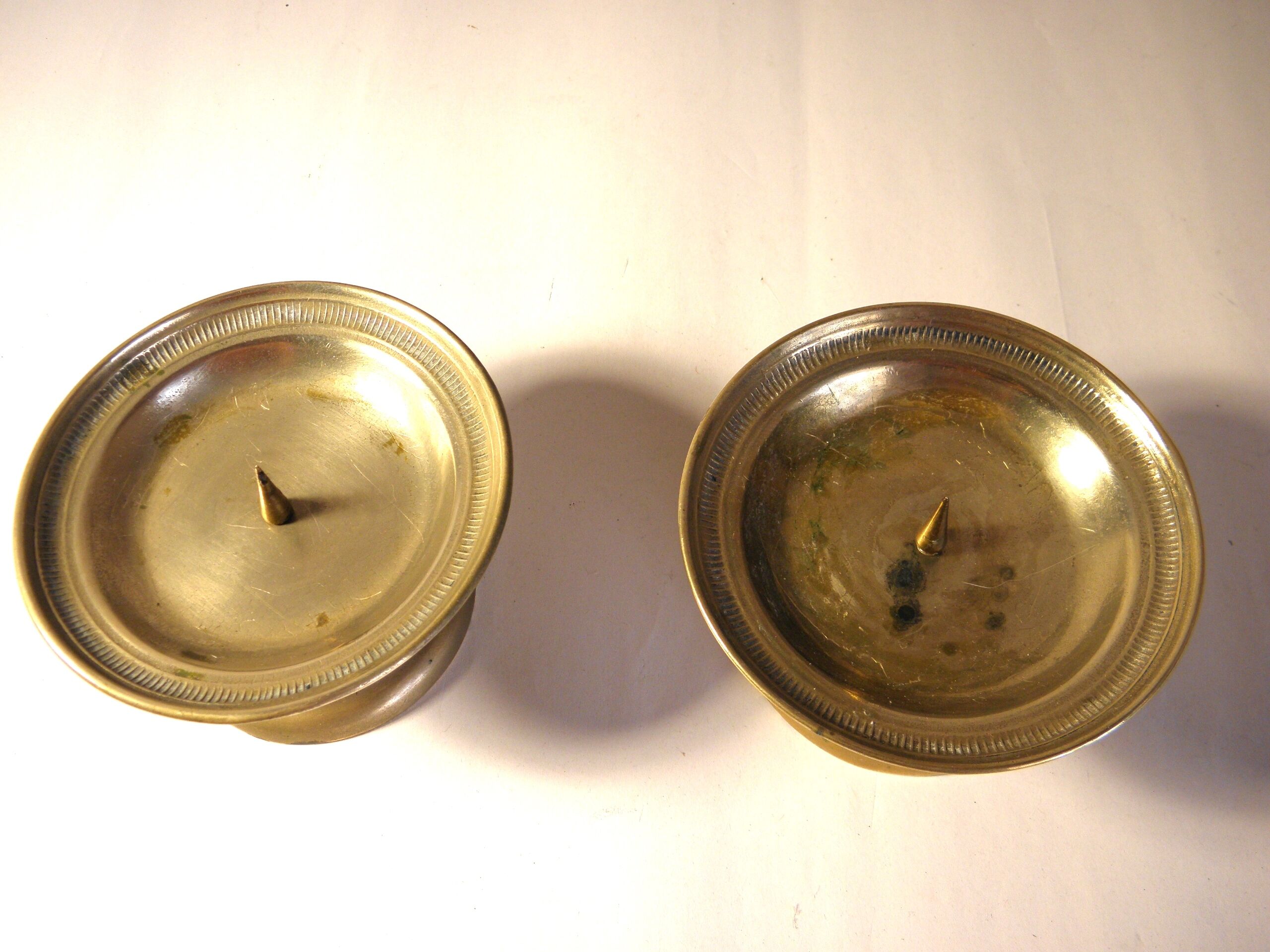 Pair of golden brass candlesticks