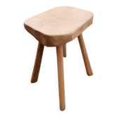 Antique stool in raw wood