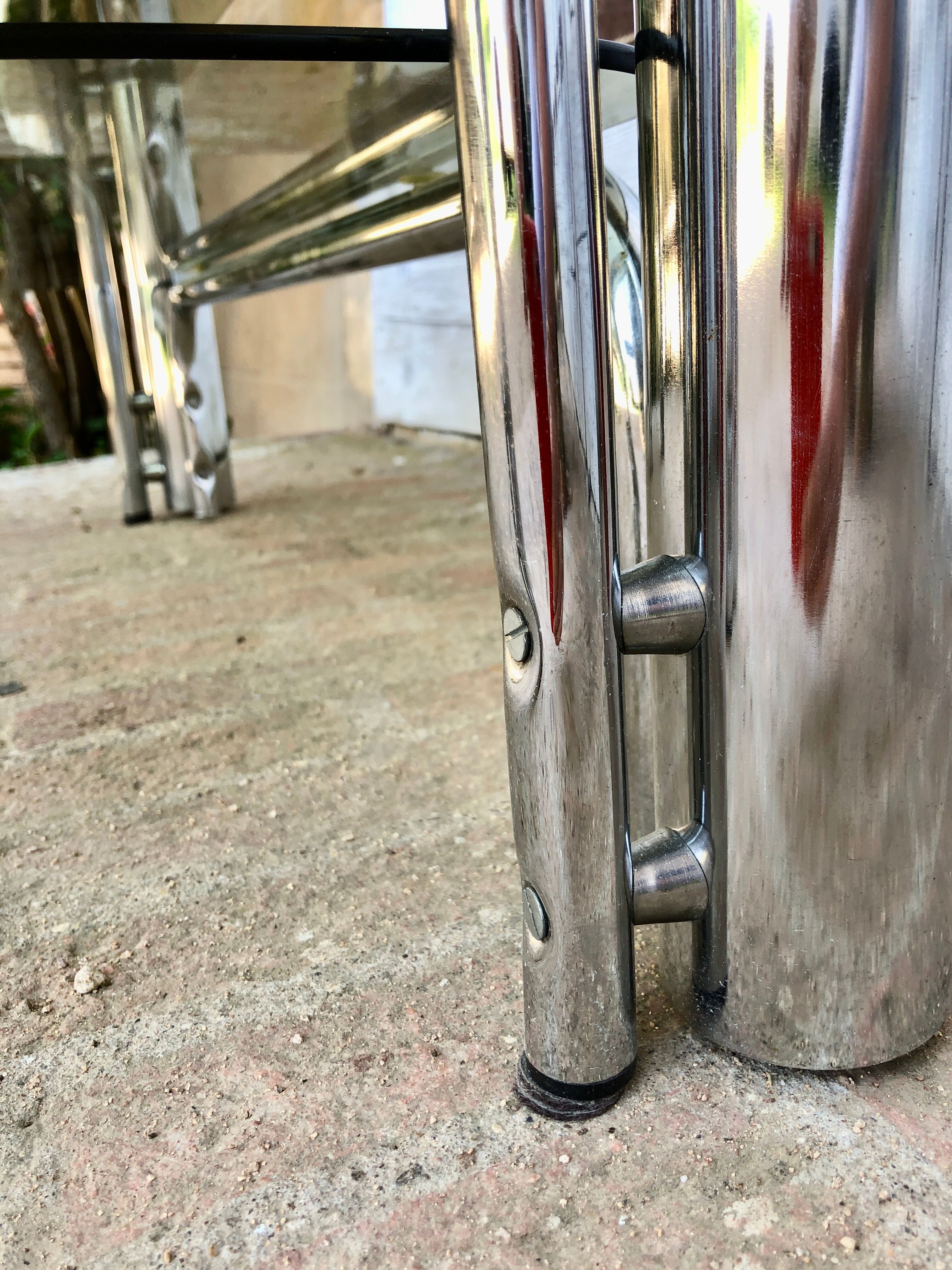 Coffee table chrome tubes and smoked glasses 1970
