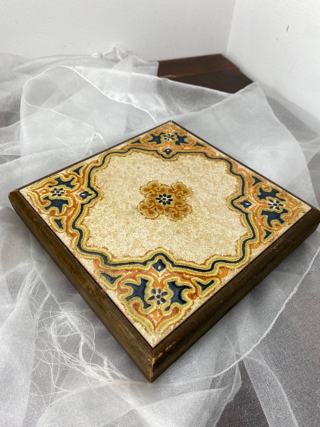 Ceramic and wood trivet