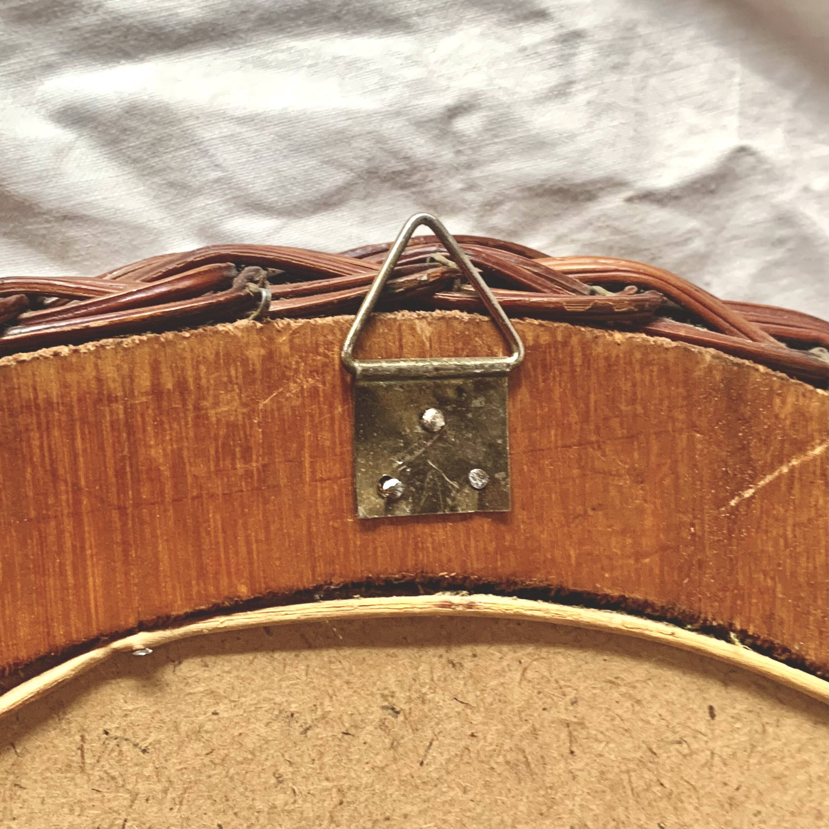 Vintage round woven rattan wall mirror