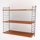 Scandinavian Hylla teak wall shelf with brass label